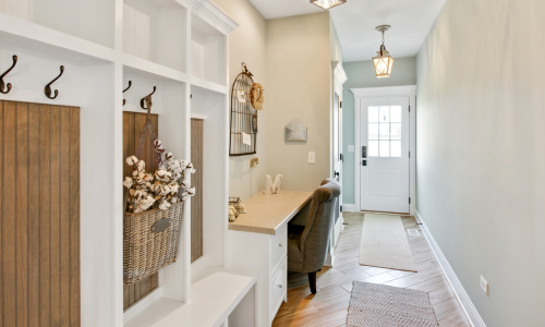 An interior door inside of a home at the end of a hallway